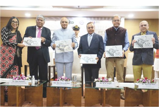 Hon’ble Governor releases coffee table book on the occasion of Padma Bhushan Mr. Dev Anand's birth centenary